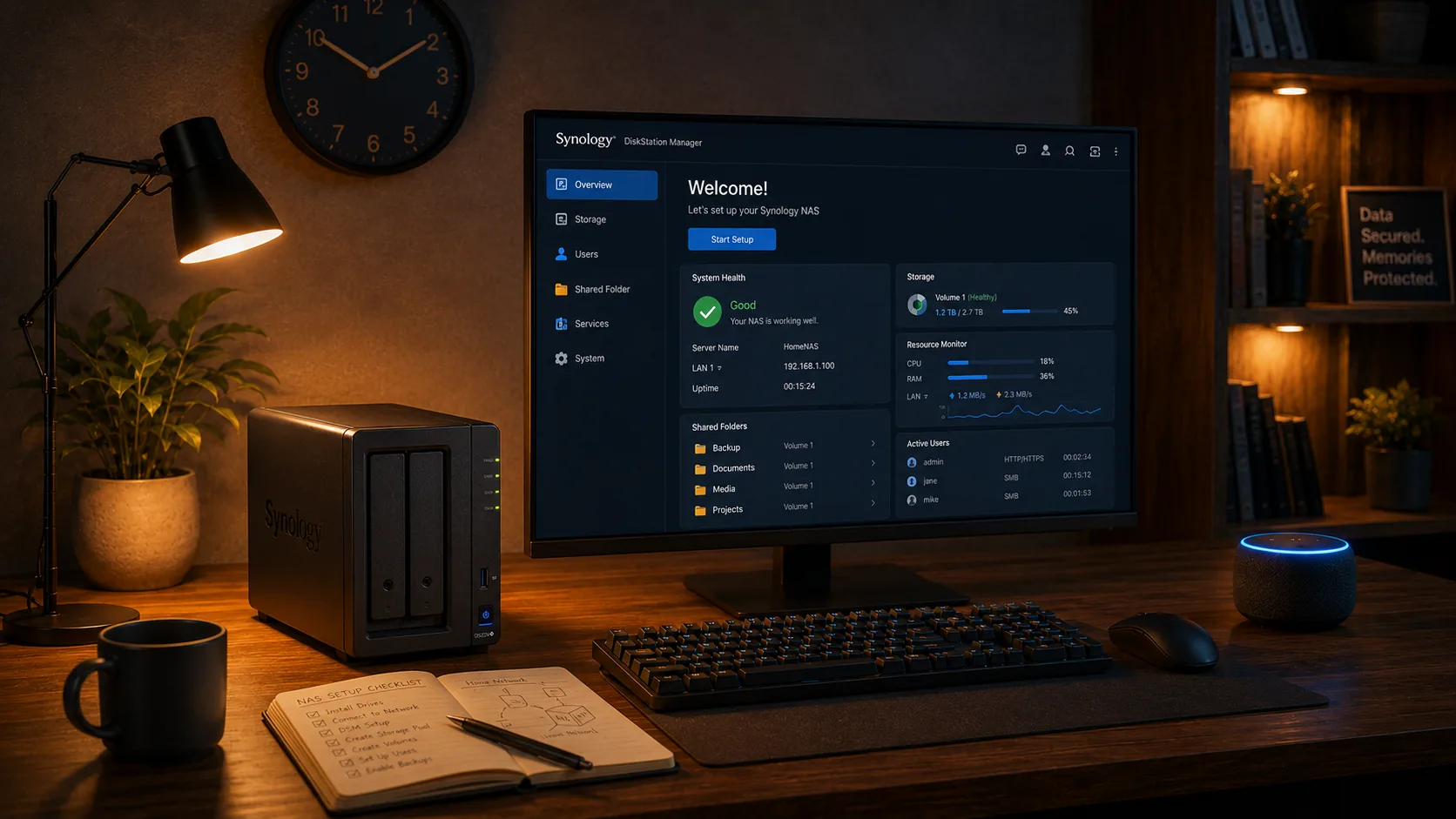 Desk with a Synology NAS, a monitor showing DSM and an Echo Dot